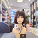 tóc bob uốn cụp làm bằng tóc giả